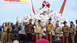 Pelaksana Tugas (Plt.) Bupati Lampung Tengah, I Komang Koheri, Menghadiri Doa Bersama Serta Pembagian Sembako Dalam Rangka HUT Kampung Tanjung Anom ke-51.