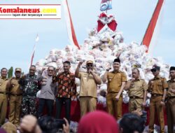 Pelaksana Tugas (Plt.) Bupati Lampung Tengah, I Komang Koheri, Menghadiri Doa Bersama Serta Pembagian Sembako Dalam Rangka HUT Kampung Tanjung Anom ke-51.