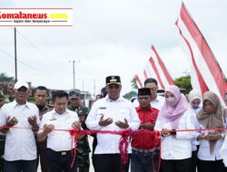 Pelaksana Tugas (Plt) Bupati Lampung Tengah, I Komang Koheri, S.E., M.Sos., Resmikan Rigid Beton dan Aspal Jalan Penghubung Kampung Negara Aji Tua – Marhen.